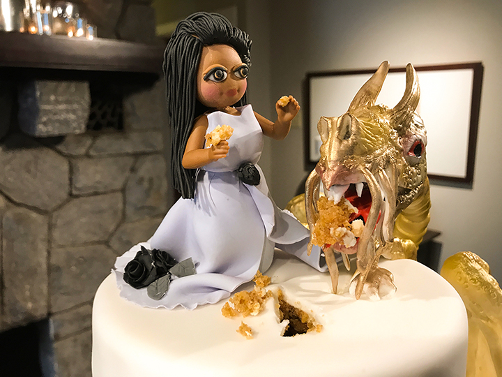 dragon climbing up a wedding cake